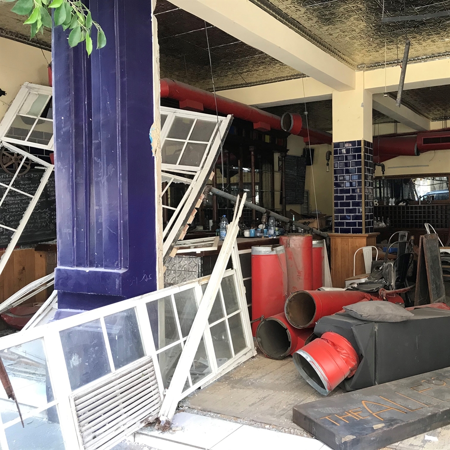 In Mar Mikhael, a café and bookshop is in ruins (Photo: Ahmad Gharbieh)