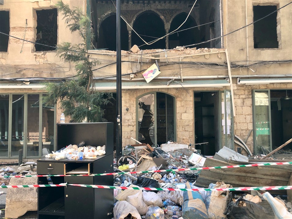 A local business located on the ground floor of a structurally damaged heritage building in Gemmayzeh in the aftermath of the port blast on August 4th. (Photo: Luna Dayekh)
